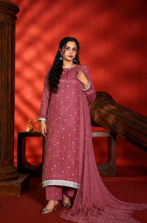 Woman in a pink traditional outfit with a red background